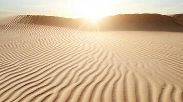 The sun is shining over a desert with sand dunes photo