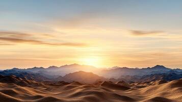 Golden desert landscape glowing in warm twilight tones, showcasing serene mountains photo