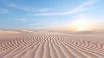 Vast desert dunes with gentle ripples under clear sky at sunset evoke tranquility and beauty photo