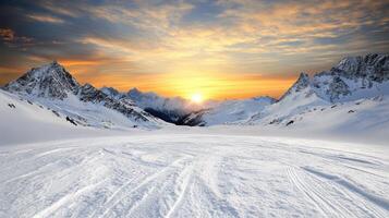A snowy mountain landscape with a sun setting behind it photo