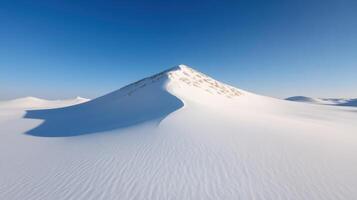 Snowy ridge, clean sunlight, cool air, serene landscape photo