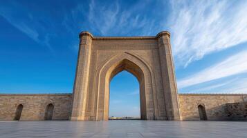 Intricate carvings on monumental gateway under blue sky create stunning view photo