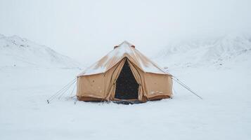 A tent is set up in the snow photo