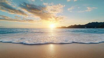 The sun setting over the ocean and waves on the beach photo