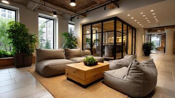 A modern office with large windows and a large couch photo