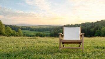 A chair sits in the middle of a field photo