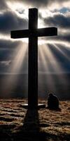 Quiet reflection at a cross under dramatic skies photo