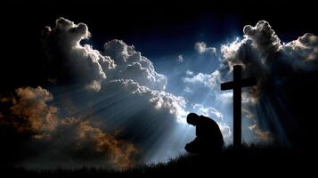 Moment of reflection during a sunset near a cross photo