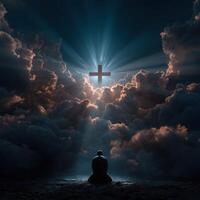 Man meditating under a cross in a dramatic cloudscape photo