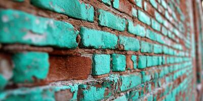Vibrant turquoise and red brick wall texture in urban area photo