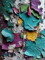 Vibrant layers of paint peeling from a weathered surface photo