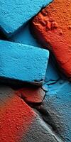 Colorful abstract texture of bricks with blue and orange hues photo