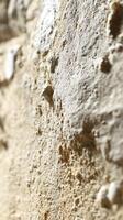 Texture of natural rock surface revealing layers and patterns photo