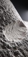 A close up of a rock with a hole in it photo