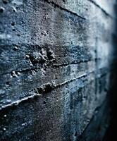 Close-up view of textured concrete wall with aged features photo
