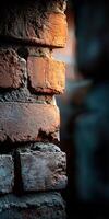 Unique texture of a weathered brick wall in soft lighting photo