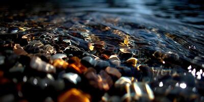 Colorful pebbles submerged in crystal clear water photo