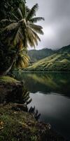 Calm lake surrounded by lush greenery under cloudy sky photo