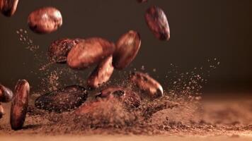 Cocoa beans fall on the table. Filmed on a high-speed camera at 1000 fps. High quality FullHD footage video