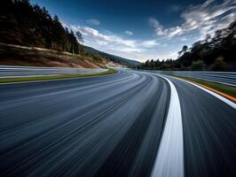 Curved road with tire marks under a cloudy sky photo