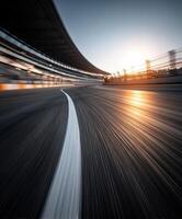 Spectacular curve on racing track during sunset photo