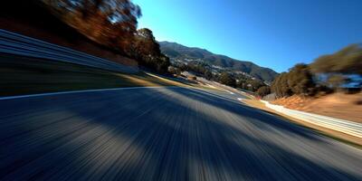 Fast cars racing along a winding track in sunny weather photo