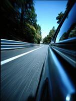 A car driving down a road with blurry images photo