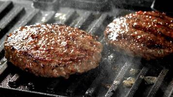 Beef burger in a skillet. Filmed on a high-speed camera at 1000 fps. High quality FullHD footage video