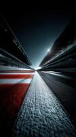 Fast track view of a racing circuit under bright lights photo