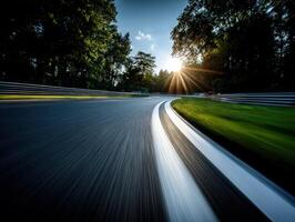Sunset at a winding racetrack with blurred motion and greenery photo