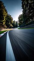 Racing curve at a famous motorsport circuit in twilight photo