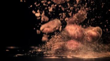 Cocoa beans fall on the table. Filmed on a high-speed camera at 1000 fps. High quality FullHD footage video