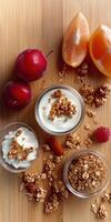 Delicious yogurt parfaits with fruit and granola on wooden board photo