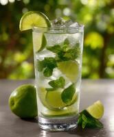 Refreshing mojito with mint and lime on a sunny day photo