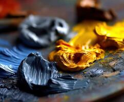 Colorful paints on an artist's palette ready for use photo
