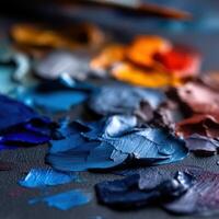Colorful palette of oils at an artist's studio table photo