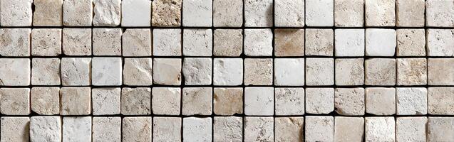 Textured stone tiles arranged in a uniform pattern photo