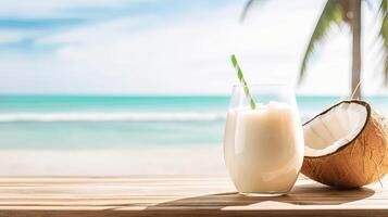 Refreshing Coconut Drink on a Beach with Ocean View and Palm Tree photo