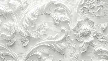 Elegant White Floral Relief Design on Textured Background photo