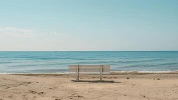 Serene Beach Scene with Empty White Bench Facing Calm Ocean Waves photo