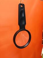 Magnifying glass displayed photo