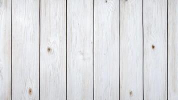 White wooden planks with natural grain texture featuring vertical alignment and visible knots with subtle rustic appearance suitable for backgrounds and design projects. photo