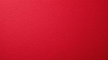 Bright red textured paper background with subtle grain detail and a uniform surface, ideal for design and decorative uses. photo