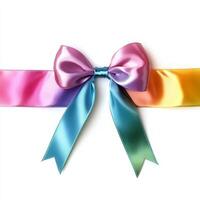 Vibrant multicolored satin ribbon with bow on white background photo