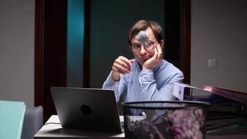 Bored office worker throwing crumpled paper at work video