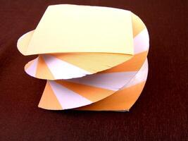 Orange and white papers for notes photo