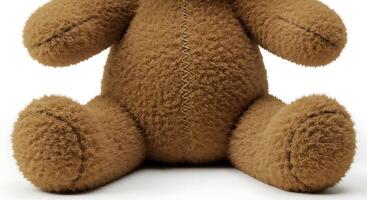Close-up of Plush Teddy Bear on White Background for Toy Concepts photo