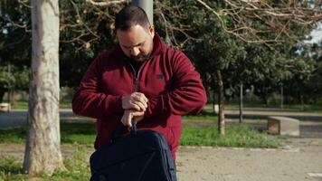 Man After Work Checking The Clock A Looking For Someone video