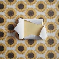 Sunflower Pattern with Torn Paper Frame for Business Announcements photo