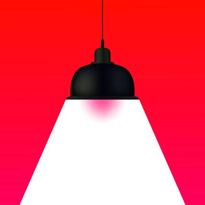 A black and white light hanging from a red light